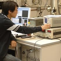 A researcher performs a nanotechnology experiment.