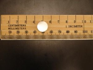 An efficient catalyst is needed to get the half liter of hydrogen out of this small, 240 mg pellet of solid ammonia borane. Credit: Pacific Northwest National Laboratory