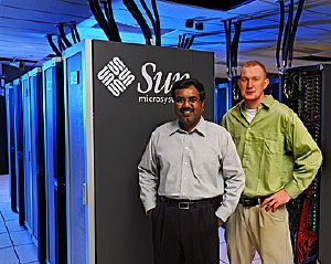 Srinivas Aluru, left, and Steve Nystrom have worked for months to connect cables and cooling hoses and otherwise get Iowa State University