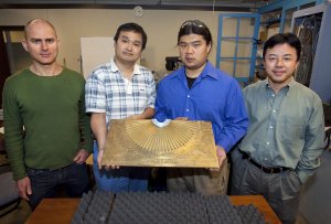 Berkeley researchers (from left) Guy Bartal, Xiaobo Yin, Lee Fok and Xiang Zhang shown with their acoustic hyperlens which boosts the magnification of sound-based imaging technologies such as ultrasound and underwater sonar by eightfold. (Photo by Roy Kaltschmidt, Berkeley Lab Public Affairs)