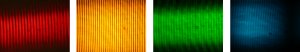 These are photographs of four different regions of the new optical frequency comb. The light is filtered through a grating spectrometer and photographed with a digital camera through a microscope. Each visible line or "tooth" is an individual frequency in the comb, which spans the visible spectrum from red to blue. More than 1,500 such photos would need to be lined up to show the entire comb. Credit: S. Diddams/NIST
