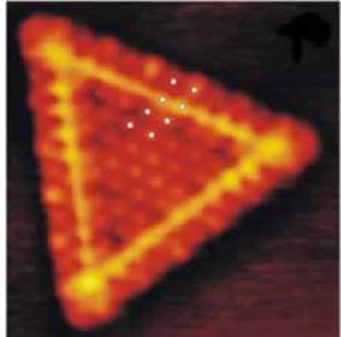AZoNano, Nanotechnology - This graphic shows a triangular single layer MoS2 nanocluster. In figures 2 and 3, the small white dots illustrate the position of the protrusions.