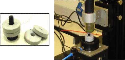 Weights added on the top working electrode used to investigate performance of bucky paper under additional load.