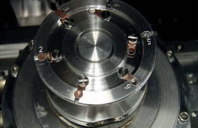 The images of a multi sample carousel holder, a TEM grid carousel holder and a formvar slot grid with17 serial ultra sections.