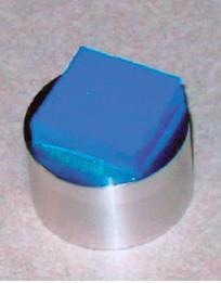 Highly plasticized PVC (3M EAR C-1002-25) mounted for testing.