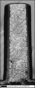 The pattern quality map illustrates the grain structure within the TSV.