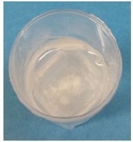 Powder now wetted and dispersed better after adding surfactant.