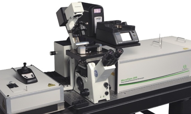 Combined setup of the BioScope Catalyst and the MicroTime 200. The AFM with its sample stage is mounted on the inverted microscope body of the MicroTime 200, which is configured for objective scanning.