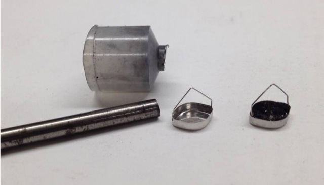Funnel, tamper, empty pan, and run sample.