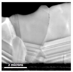 SEM image of a CdTe/CdS photovoltaic heterojunction in cross-section.