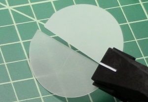 Bare sapphire wafer during cleaving with the Cleanbreak pliers.