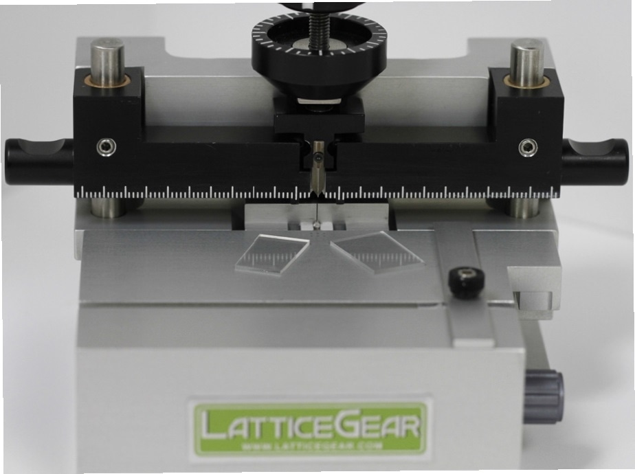 Glass slides cleaved using the LatticeAx. The scribeless cleave process of the LatticeAx eliminates generation of dust particles, making it ideal for downsizing the glass slide that already contained unique, proprietary fibers.