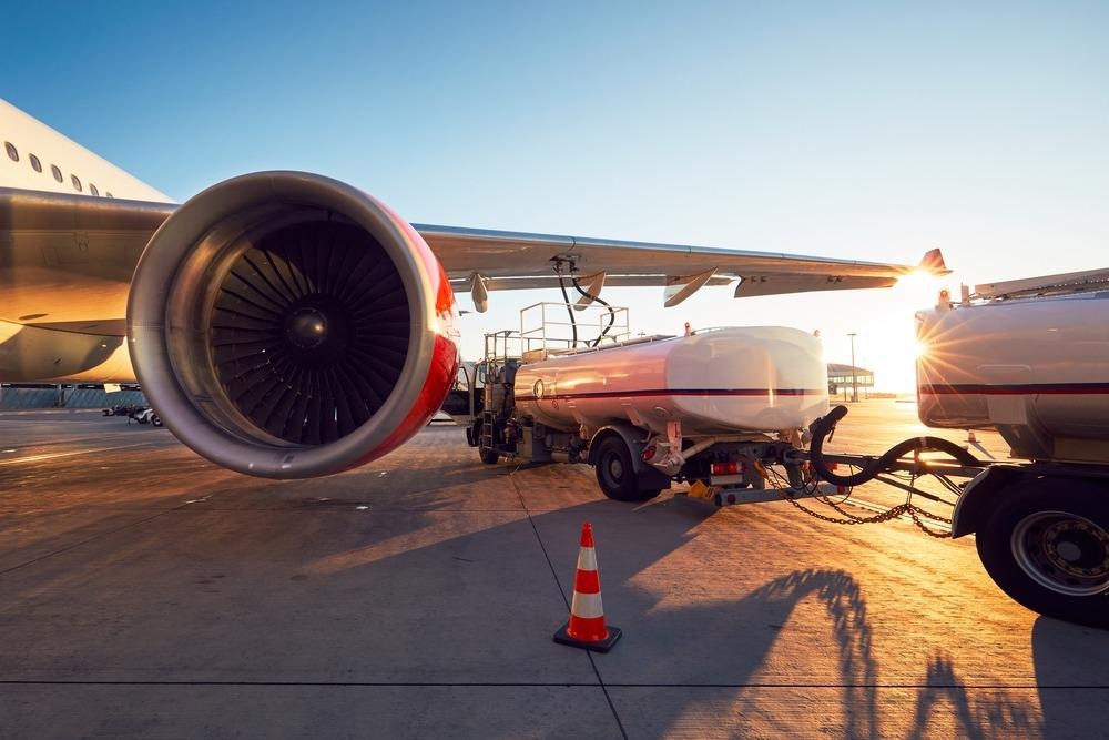 Plane fueling up before take off, aviation fuel