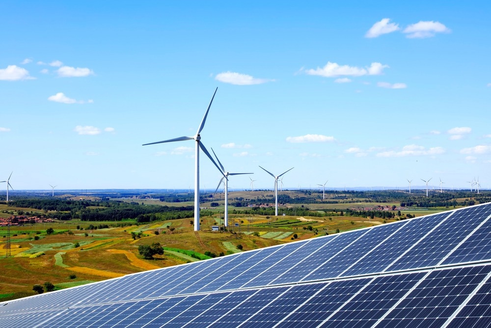 Solar photovoltaic panels and wind turbines. Energy concept
