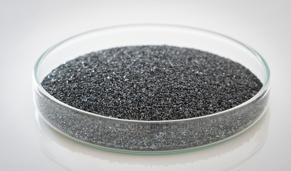 Silicon carbide in petri dish on white background