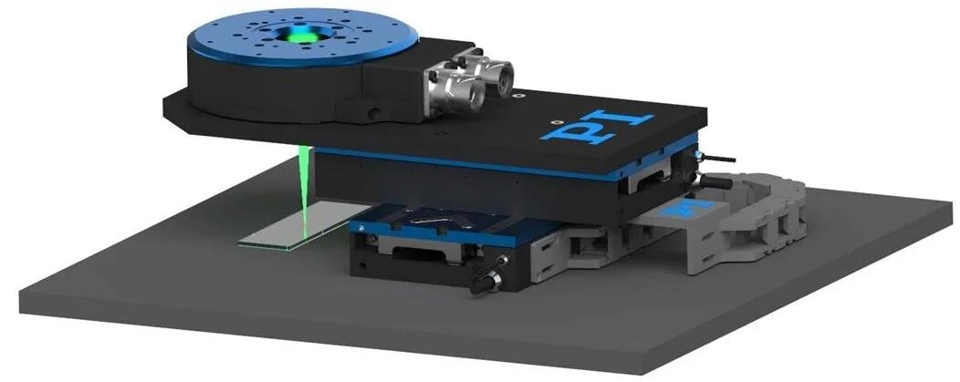 XY-Theta stage assembly with clear aperture for light path, providing 25x80 mm travel