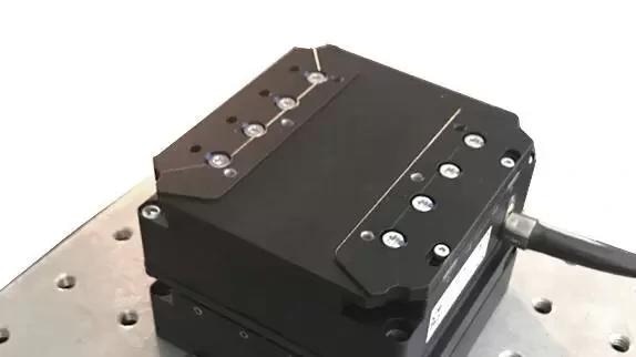 An XY-combination of the V-308 stage was mounted on a honeycomb breadboard for this test