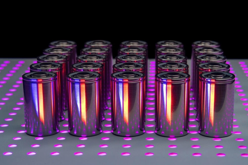 The concept of the new high-capacity 4680 format batteries. A prototype of new batteries on a laboratory bench.