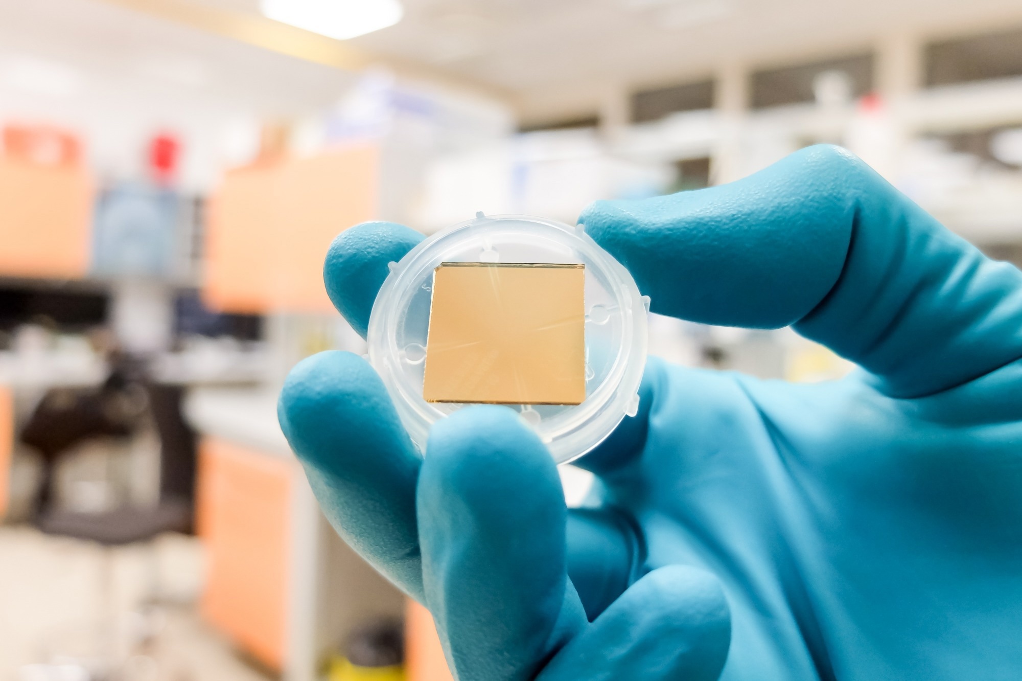 An SPR (surface plasmon resonance) chip made of gold.