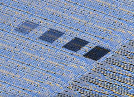 Four contamination rectangles were created on a patterned silicon wafer sample by rastering the beam for 1, 2, 4, and 8 hours (left to right respectively) at 2 kV and a beam intensity of 18 in the MIRA3. To record this image a TESCAN MIRA3 Field-Emission SEM was equipped with an Evactron® E50 plasma cleaner, a SmarAct 8 axes piezo stage, and a multi-detector setup made by Pointelectronic. The thickness of the hydrocarbon deposition layer on the darkest rectangle on the right is ~1000 nm (Armbruster et al., 2019)