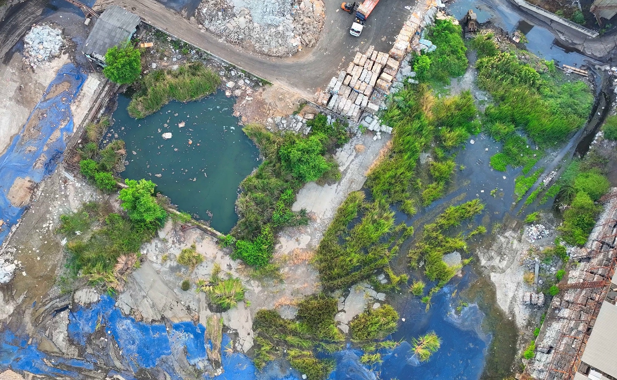 Industrial processes produce wastewater containing harmful chemicals, heavy metals, and toxins, posing a grave threat to aquatic ecosystems and human health. Microplastics and oil spills concept.