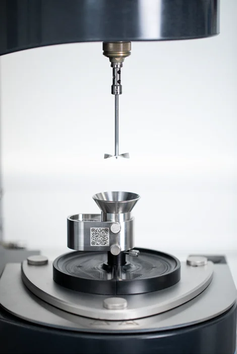 HAAKE MARS iQ Rheometer series with powder rheology accessory for powder flow measurements.