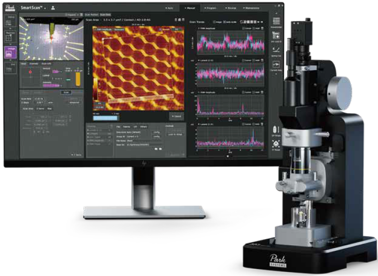 NX1 with the SmartScan™ operating interface. The monitor displays atomic-scale imaging results and real-time measurement signals during AFM operation