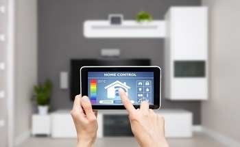 Ambient Intelligence Applied To Household Products and Services To Develop A Future Society With Adaptive Intelligent Homes, Communities and Work Spaces