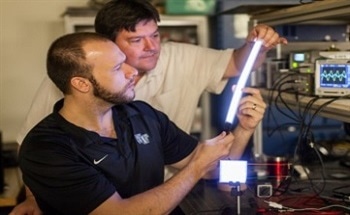 Tuneable Plastic Lighting with Carbon Nanotube Polymer Nanocomposites