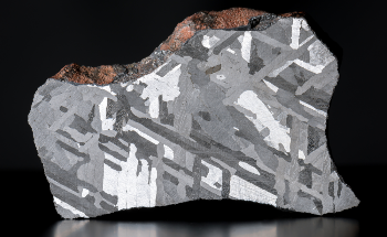 Controlling Electromagnetic Properties in ‘Space Metal’ for Spintronic Computing
