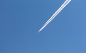 Thermal Cloaking and Heat Signature Control with Nanostructured Films