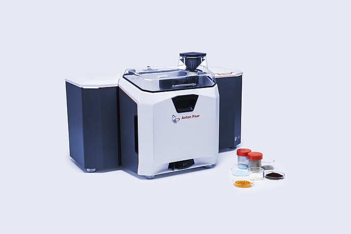 The Litesizer DIA 500 with sample pots of different sized particles.