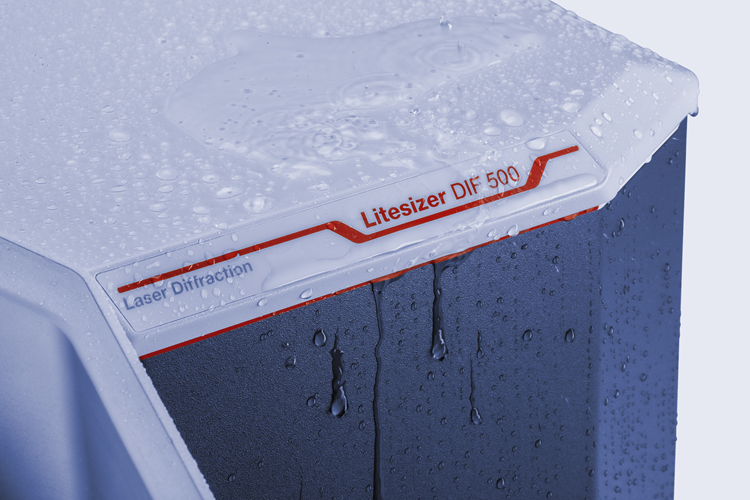 A close up shot of the DIF litesizer analyzer, with beads of water on the outside. This represents the machines robustness against spills.