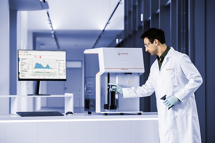 Male scientist operating the Autosorb 3300
