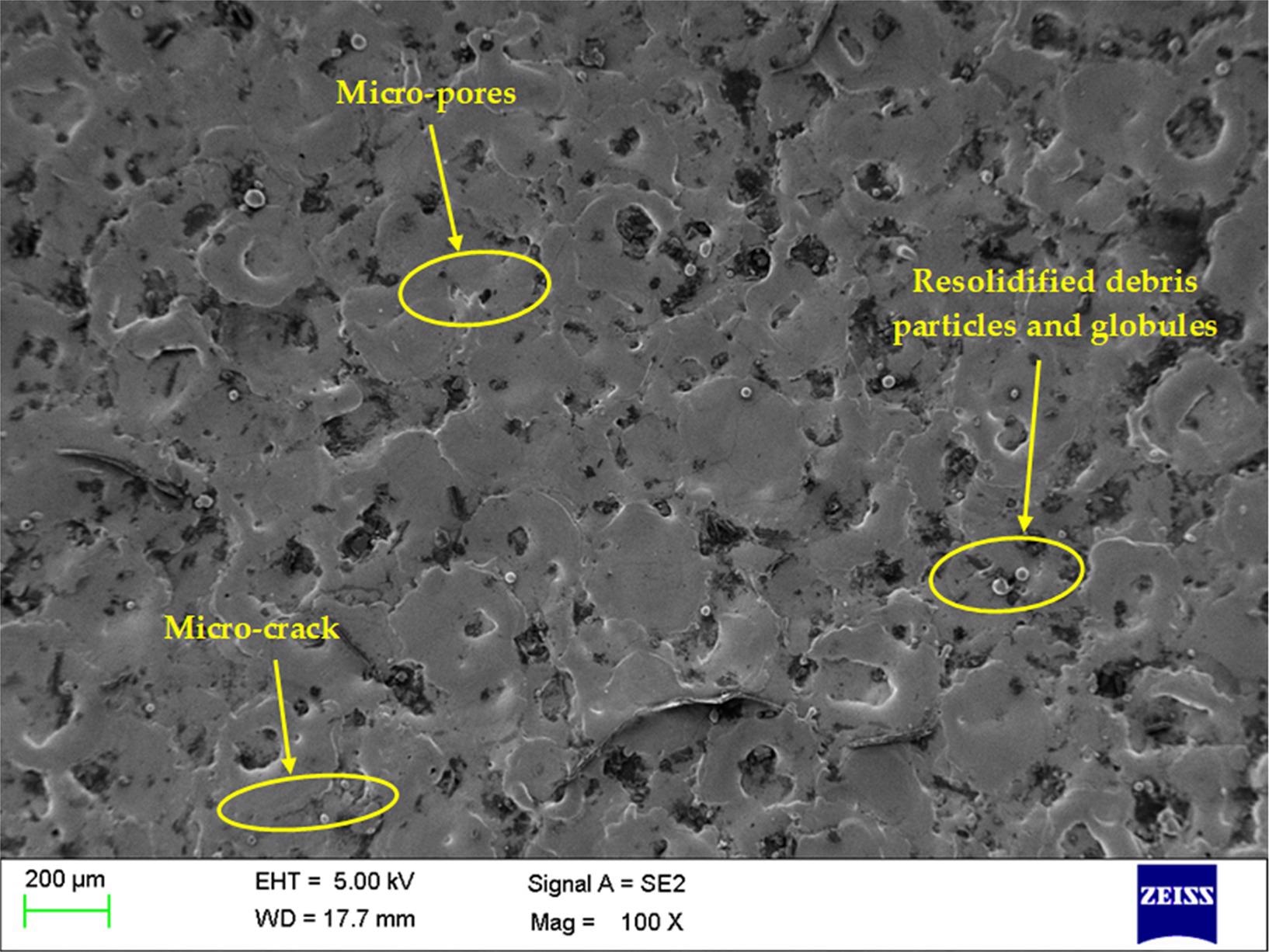 SEM analysis of machined Nitinol at Ton of 8 µs, Toff of 6 µs, PC of 2 g/L, and current of 6 A.