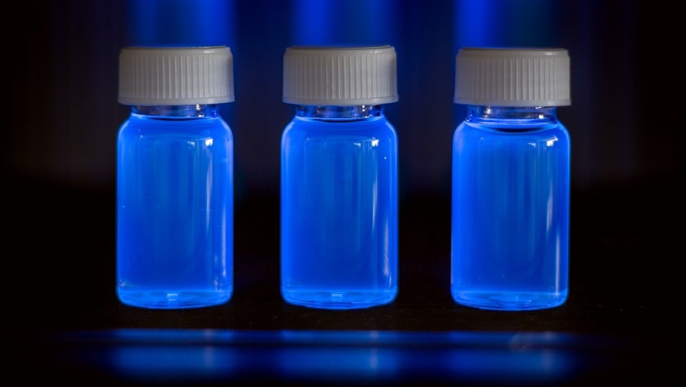 Further Insight on Charge Carrier Dynamics in Graphene Quantum Dots