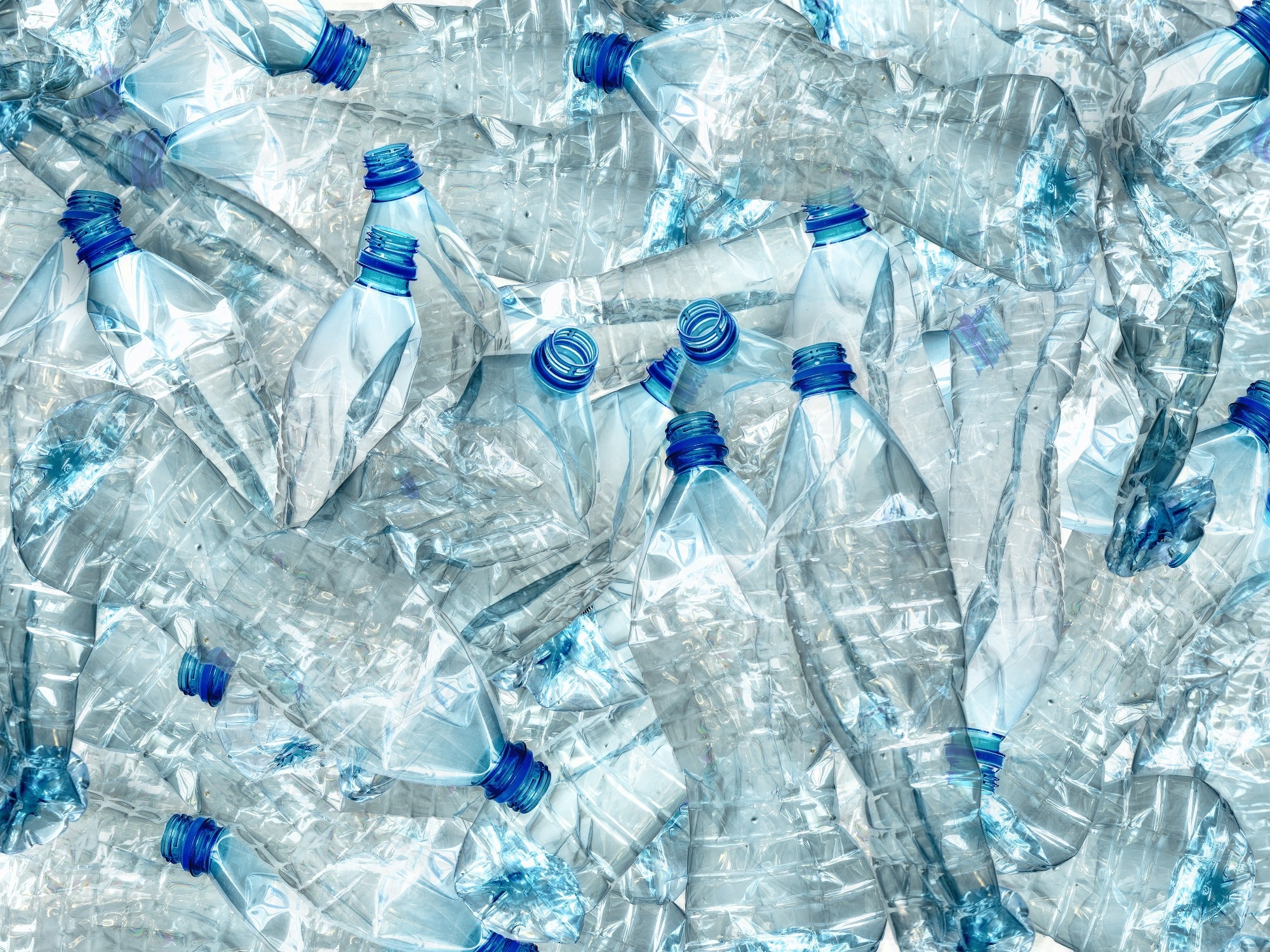 Background of many used empty PET bottles