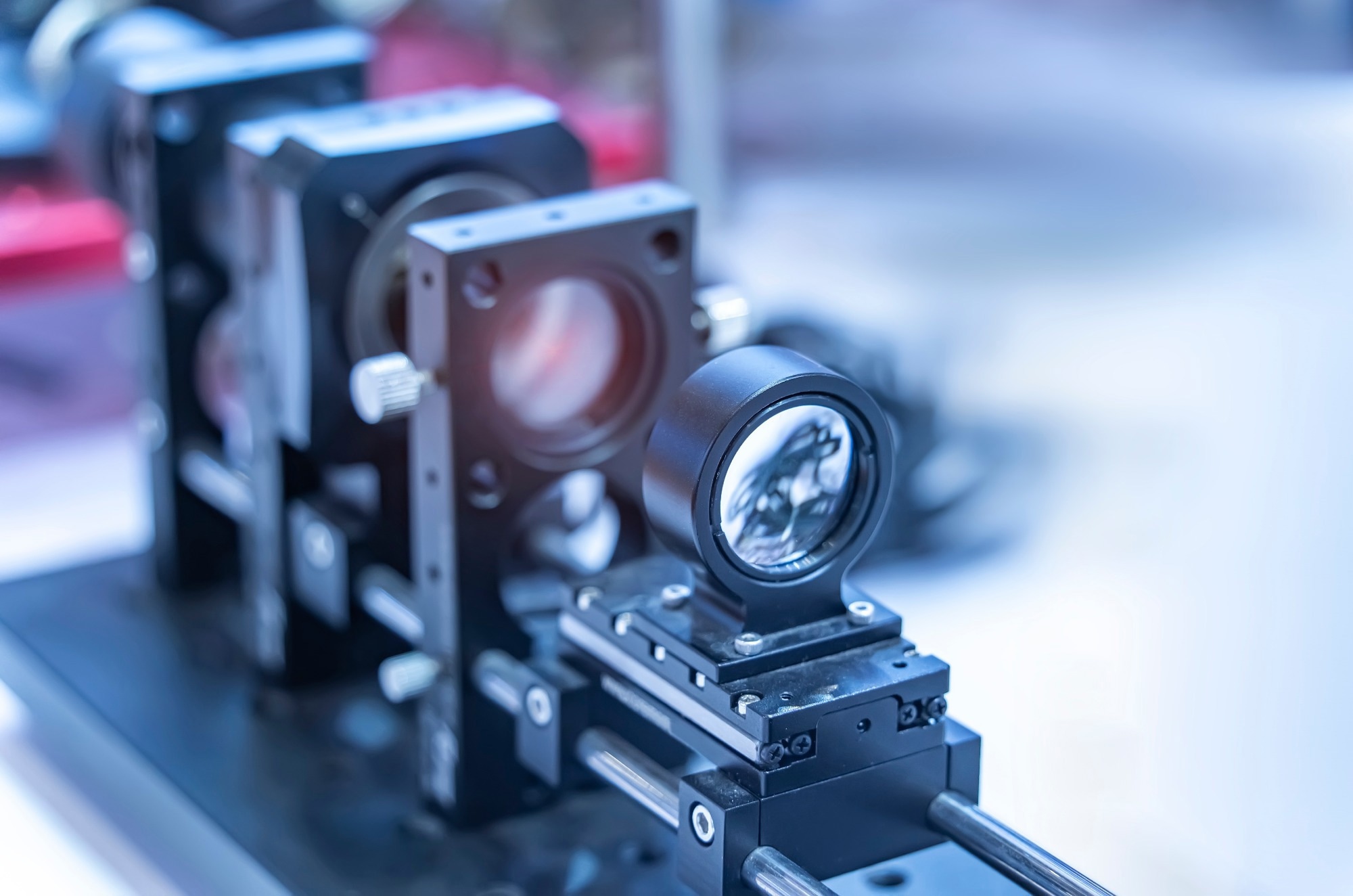 Experiment with laser device in optical laboratory