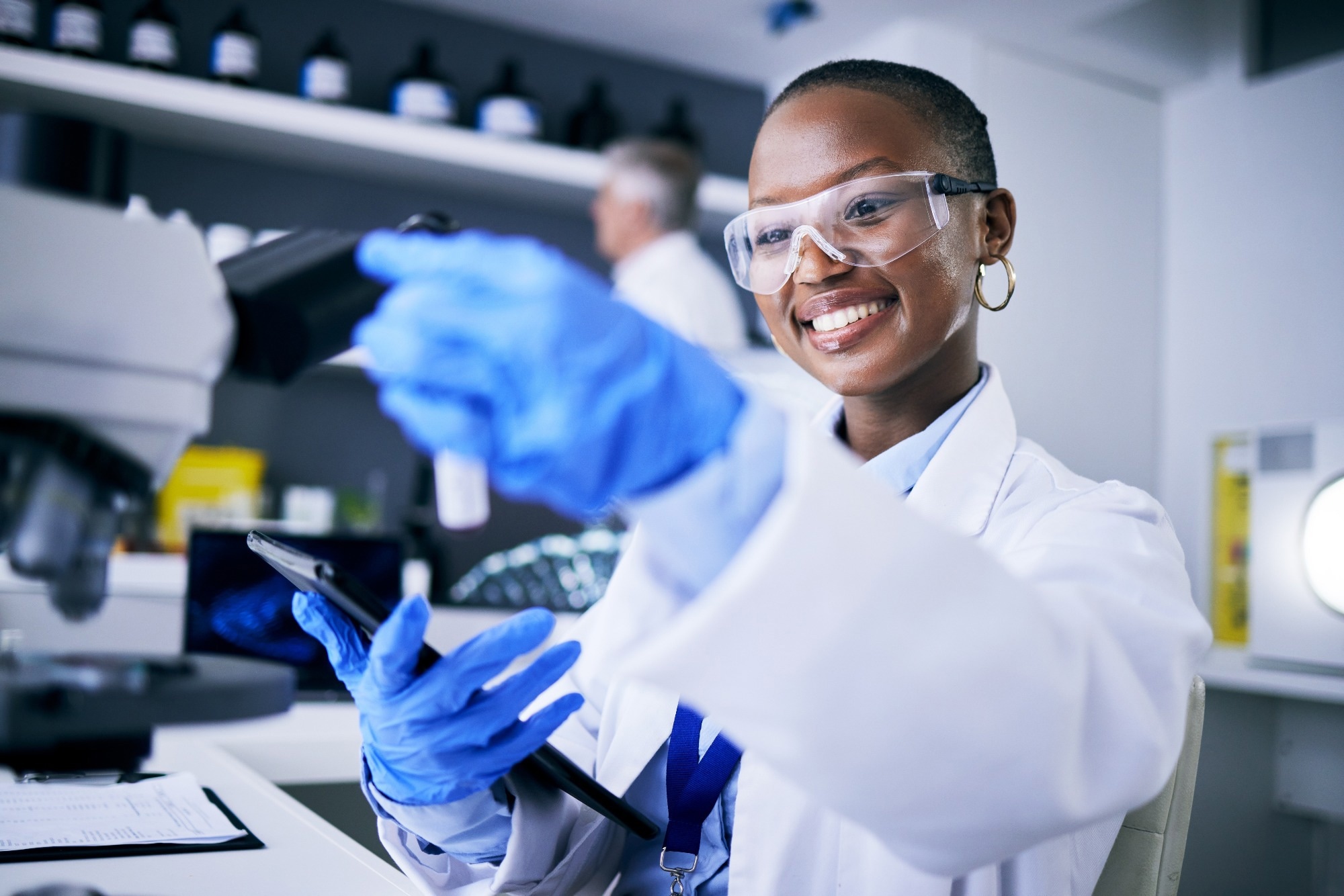 Scientist looking at a sample in a lab