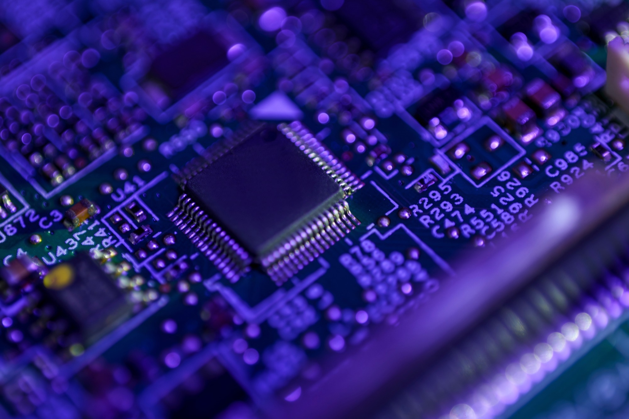 Close-up of a microchip on a circuit board.