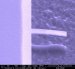Defects at Grain Boundary in Ultrananocrystalline Diamond Hold Responsibility for Fundamental Mechanism of Energy Dissipation