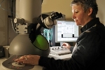 Novel Technique to Image Nanoparticle Dynamics in a Liquid Environment with Atomic Resolution