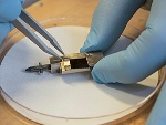 Hybrid Metal/Organic Nanowires Compensate for Metal Losses in Plasmonic Nanostructures