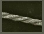 Cube-Shaped Nanoparticles Self-Assemble into Winding Helical Structures