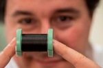 Nanotube Fibers Bridge Electrical Gaps in Scarred Heart Tissue