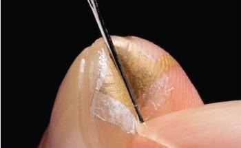 Nanomesh Pressure Sensors Have That Human Touch