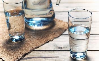 Pointing Graphene Nanochannel Water Filters in the Right Direction