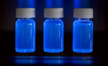 Further Insight on Charge Carrier Dynamics in Graphene Quantum Dots