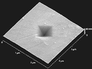 AZoNano - The A to Z of Nanotechnology - AFM image of 10mN indentation on MoS2/Pb multilayer
